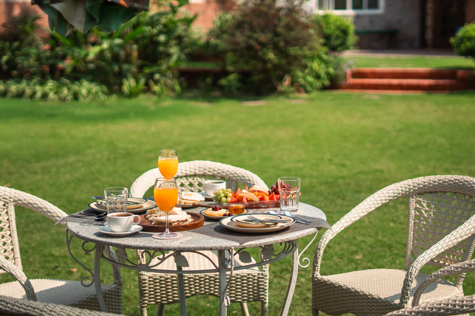 Breakfast for two on the lawn in front of the house